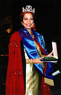 Delvene Parkin receiving the Miss Aboriginal Australia crown for 1996. The cloak was designed by Ron Gidgup.